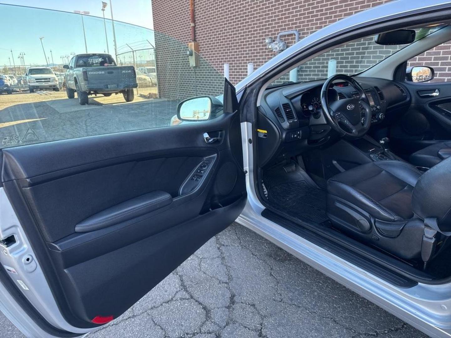 2014 Bright Silver /Black Kia Forte Koup EX (KNAFX6A8XE5) with an 2.0L I4 DOHC CVVT engine, Automatic transmission, located at 8595 Washington St., Thornton, CO, 80229, (303) 287-5511, 39.852348, -104.978447 - 2014 Kia Forte Koup FWD<br><br>D1 Auto NEVER charges dealer fees! All cars have clean titles and have been inspected for mechanical issues. We have financing for everyone. Good credit, bad credit, first time buyers.<br><br>Please call Lakewood Location 303-274-7692 or Thornton 303-287-5511 to schedu - Photo#19