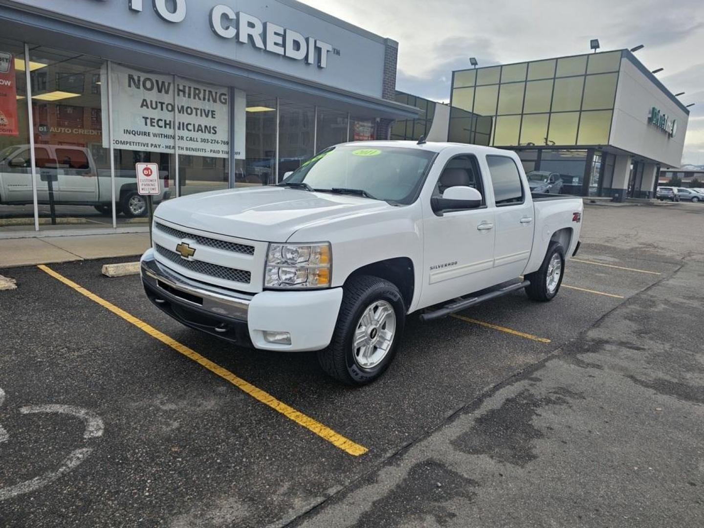 2011 Summit White /Light Titanium/Ebony Chevrolet Silverado 1500 LT (3GCPKSE31BG) with an Vortec 5.3L V8 SFI VVT Flex Fuel engine, Automatic transmission, located at 10890 W. Colfax Ave., Lakewood, CO, 80215, (303) 274-7692, 39.739914, -105.120132 - 2011 Chevrolet Silverado 1500 CARFAX One-Owner. 4WD 6-Speed Automatic, 4WD, Light Titanium/Ebony Cloth.<br><br>D1 Auto NEVER charges dealer fees! All cars have clean titles and have been inspected for mechanical issues. We have financing for everyone. Good credit, bad credit, first time buyers.<br>C - Photo#1