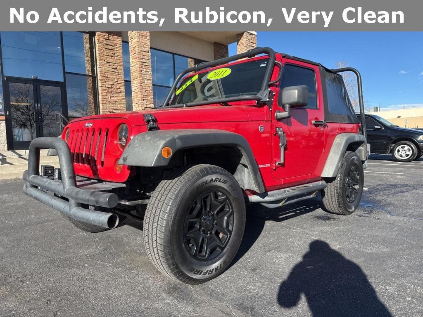 2011 Flame Red Clearcoat /Black Interior Jeep Wrangler Rubicon (1J4BA6D11BL) with an 3.8L V6 SMPI engine, Automatic transmission, located at 8595 Washington St., Thornton, CO, 80229, (303) 287-5511, 39.852348, -104.978447 - 2011 Jeep Wrangler 4WD Rubicon, the decals have just been removed from the hood. This Jeep is in excellent condition inside and out. No accidents and does not appear to have any off road use. Lots of extras on this Rubicon. Non smoker, Non pet car and really well maintained. <br><br> All Cars Have C - Photo#0