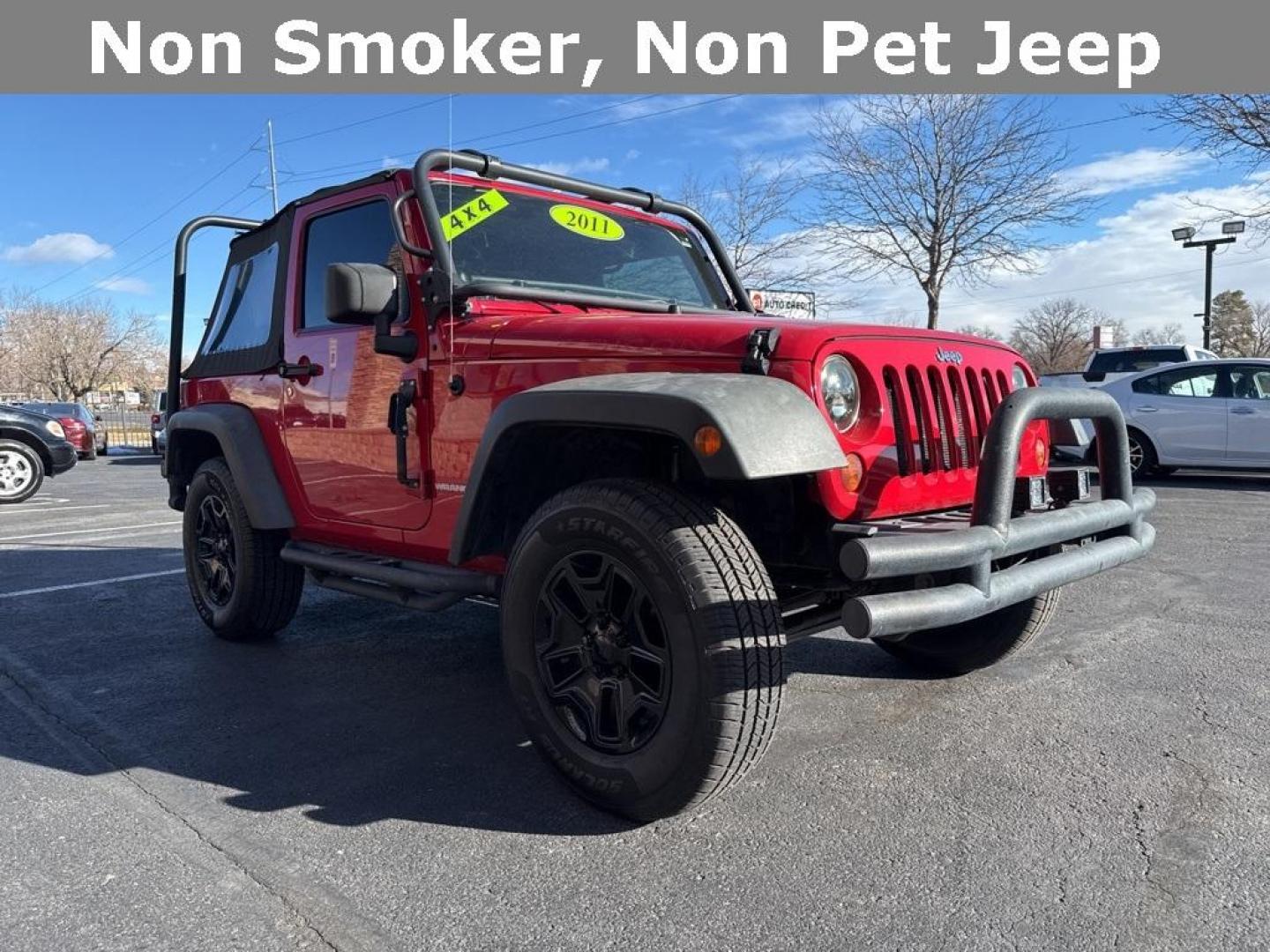 2011 Flame Red Clearcoat /Black Interior Jeep Wrangler Rubicon (1J4BA6D11BL) with an 3.8L V6 SMPI engine, Automatic transmission, located at 8595 Washington St., Thornton, CO, 80229, (303) 287-5511, 39.852348, -104.978447 - 2011 Jeep Wrangler 4WD Rubicon, the decals have just been removed from the hood. This Jeep is in excellent condition inside and out. No accidents and does not appear to have any off road use. Lots of extras on this Rubicon. Non smoker, Non pet car and really well maintained. <br><br> All Cars Have C - Photo#2