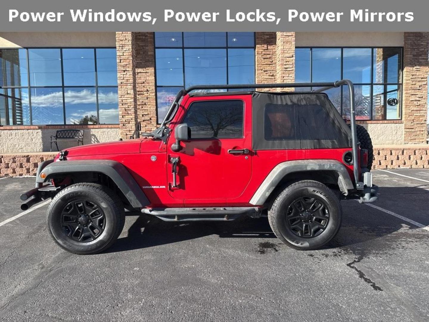 2011 Flame Red Clearcoat /Black Interior Jeep Wrangler Rubicon (1J4BA6D11BL) with an 3.8L V6 SMPI engine, Automatic transmission, located at 8595 Washington St., Thornton, CO, 80229, (303) 287-5511, 39.852348, -104.978447 - 2011 Jeep Wrangler 4WD Rubicon, the decals have just been removed from the hood. This Jeep is in excellent condition inside and out. No accidents and does not appear to have any off road use. Lots of extras on this Rubicon. Non smoker, Non pet car and really well maintained. <br><br> All Cars Have C - Photo#4