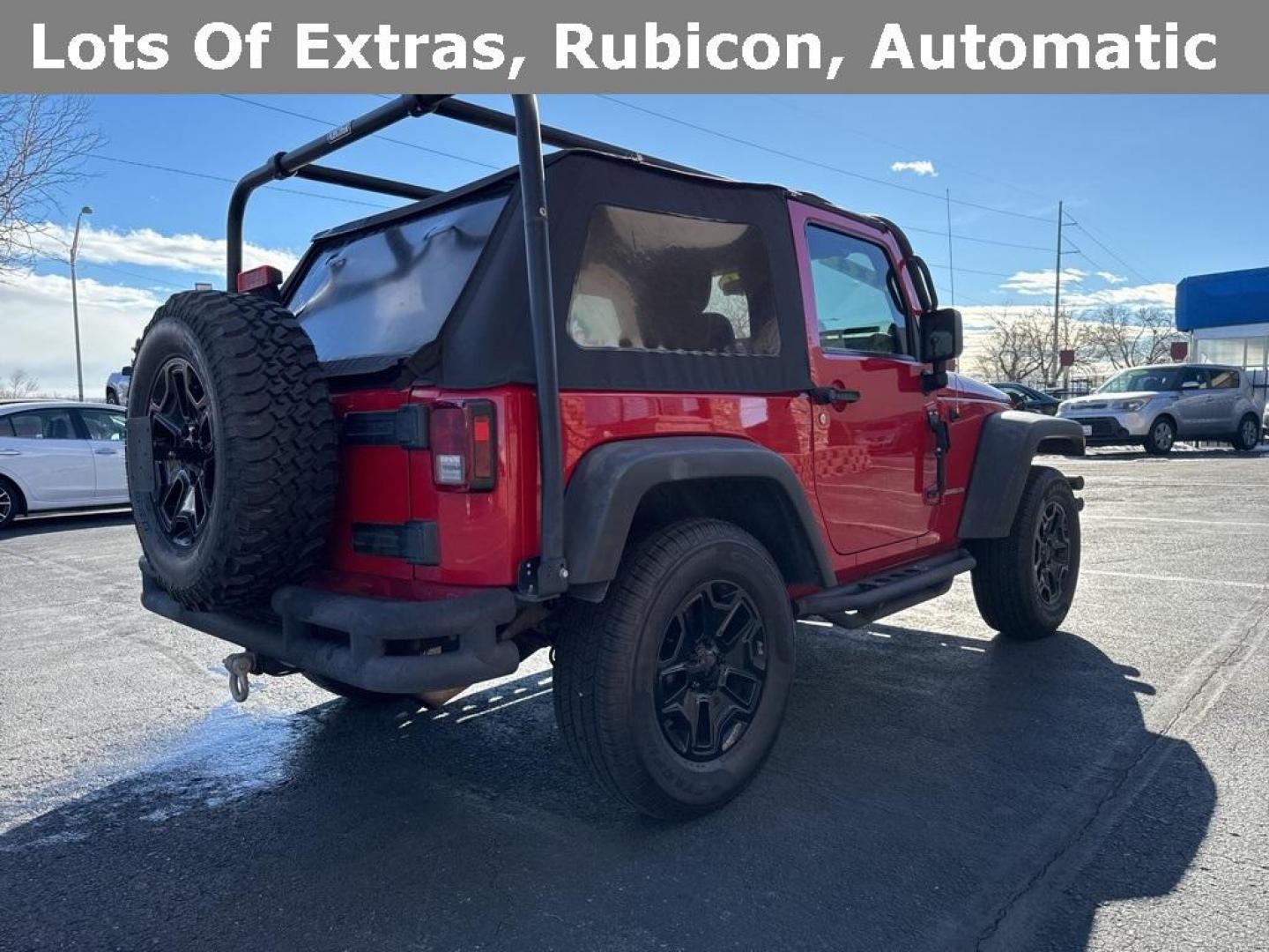 2011 Flame Red Clearcoat /Black Interior Jeep Wrangler Rubicon (1J4BA6D11BL) with an 3.8L V6 SMPI engine, Automatic transmission, located at 8595 Washington St., Thornton, CO, 80229, (303) 287-5511, 39.852348, -104.978447 - 2011 Jeep Wrangler 4WD Rubicon, the decals have just been removed from the hood. This Jeep is in excellent condition inside and out. No accidents and does not appear to have any off road use. Lots of extras on this Rubicon. Non smoker, Non pet car and really well maintained. <br><br> All Cars Have C - Photo#5