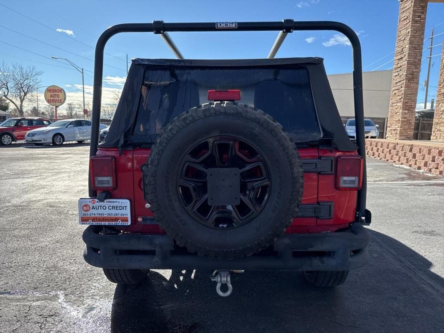 2011 Flame Red Clearcoat /Black Interior Jeep Wrangler Rubicon (1J4BA6D11BL) with an 3.8L V6 SMPI engine, Automatic transmission, located at 8595 Washington St., Thornton, CO, 80229, (303) 287-5511, 39.852348, -104.978447 - 2011 Jeep Wrangler 4WD Rubicon, the decals have just been removed from the hood. This Jeep is in excellent condition inside and out. No accidents and does not appear to have any off road use. Lots of extras on this Rubicon. Non smoker, Non pet car and really well maintained. <br><br> All Cars Have C - Photo#6