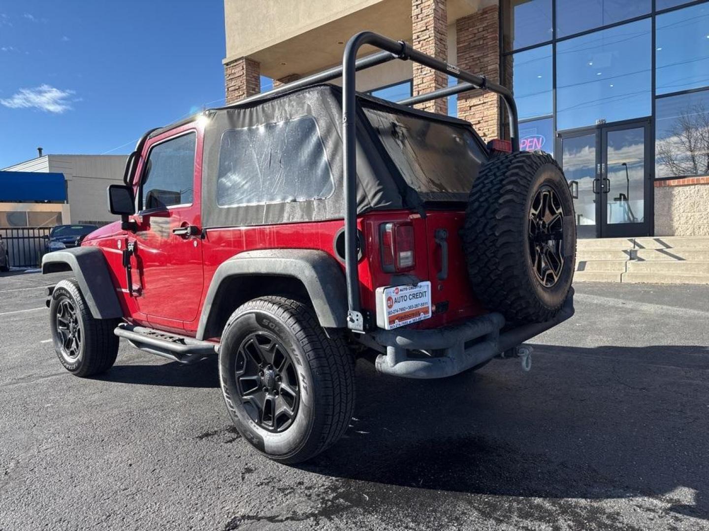 2011 Flame Red Clearcoat /Black Interior Jeep Wrangler Rubicon (1J4BA6D11BL) with an 3.8L V6 SMPI engine, Automatic transmission, located at 8595 Washington St., Thornton, CO, 80229, (303) 287-5511, 39.852348, -104.978447 - 2011 Jeep Wrangler 4WD Rubicon, the decals have just been removed from the hood. This Jeep is in excellent condition inside and out. No accidents and does not appear to have any off road use. Lots of extras on this Rubicon. Non smoker, Non pet car and really well maintained. <br><br> All Cars Have C - Photo#7