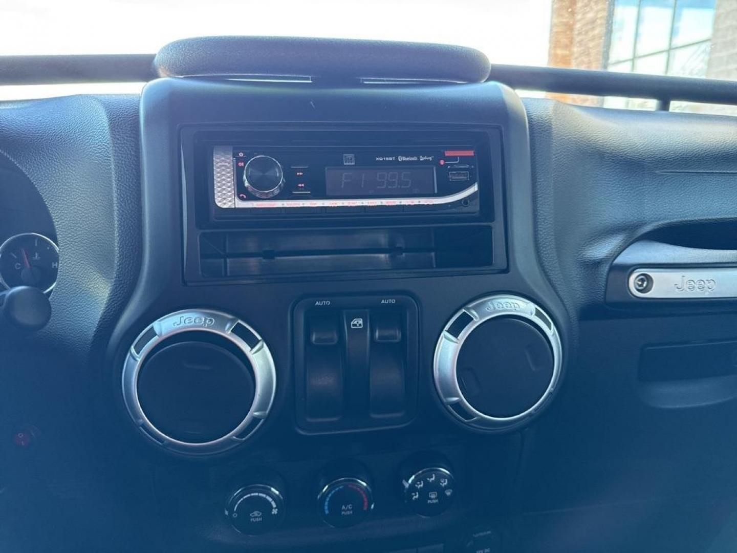 2011 Flame Red Clearcoat /Black Interior Jeep Wrangler Rubicon (1J4BA6D11BL) with an 3.8L V6 SMPI engine, Automatic transmission, located at 8595 Washington St., Thornton, CO, 80229, (303) 287-5511, 39.852348, -104.978447 - 2011 Jeep Wrangler 4WD Rubicon, the decals have just been removed from the hood. This Jeep is in excellent condition inside and out. No accidents and does not appear to have any off road use. Lots of extras on this Rubicon. Non smoker, Non pet car and really well maintained. <br><br> All Cars Have C - Photo#9