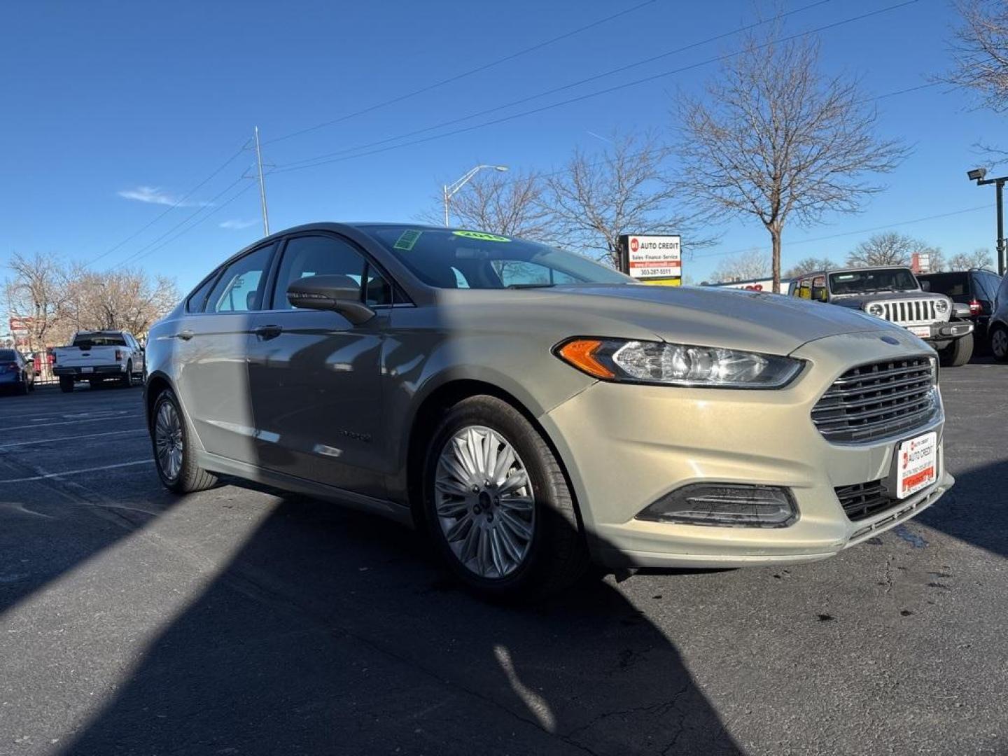 2015 Tectonic /Charcoal Black Ford Fusion Hybrid SE (3FA6P0LU4FR) with an I4 Hybrid engine, CVT transmission, located at 8595 Washington St., Thornton, CO, 80229, (303) 287-5511, 39.852348, -104.978447 - 2015 Ford Fusion Hybrid FWD I4 Hybrid.<br><br>D1 Auto NEVER charges dealer fees! All cars have clean titles and have been inspected for mechanical issues. We have financing for everyone. Good credit, bad credit, first time buyers.<br><br>Please call Lakewood Location 303-274-7692 or Thornton 303-287 - Photo#2