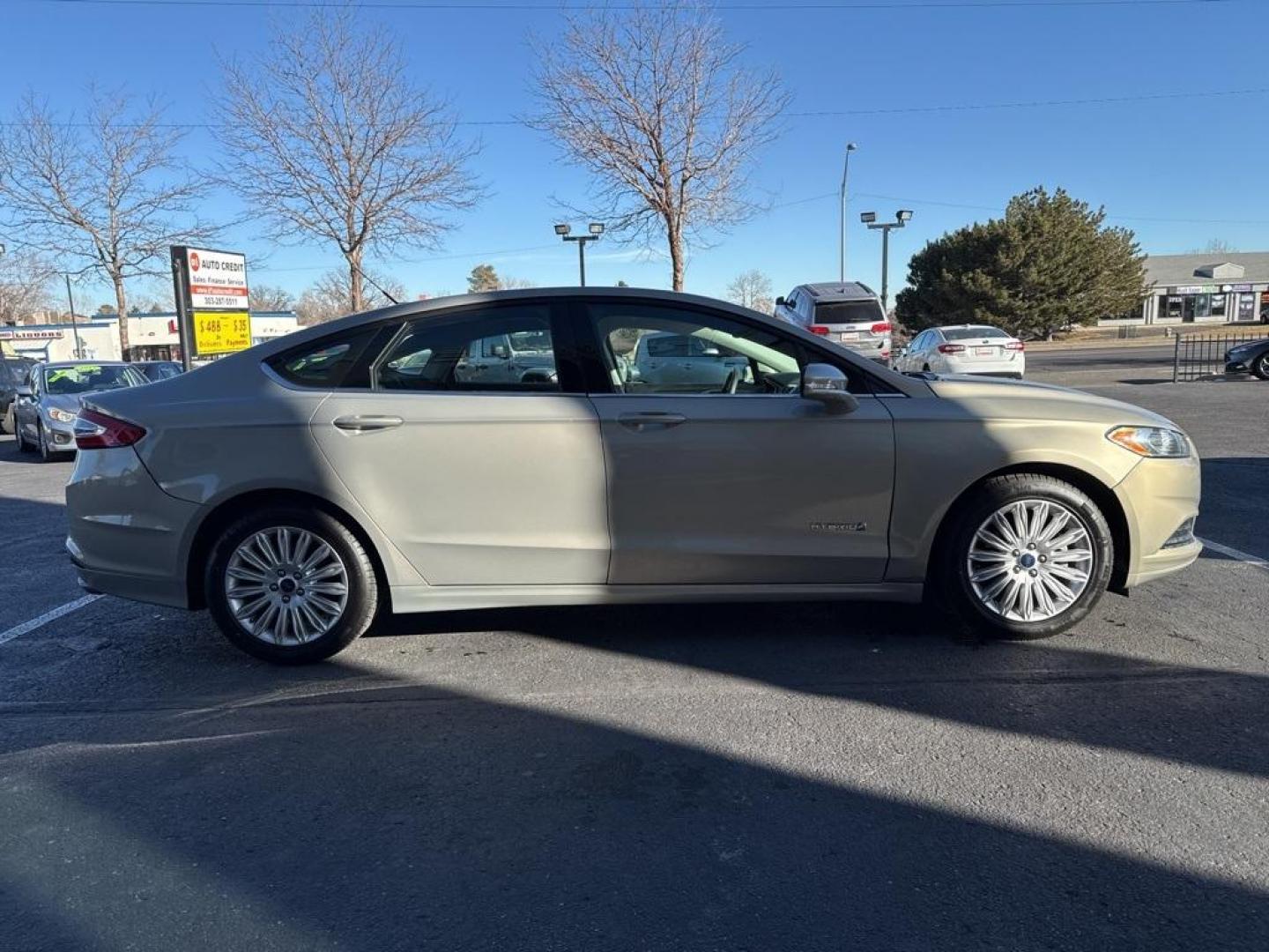 2015 Tectonic /Charcoal Black Ford Fusion Hybrid SE (3FA6P0LU4FR) with an I4 Hybrid engine, CVT transmission, located at 8595 Washington St., Thornton, CO, 80229, (303) 287-5511, 39.852348, -104.978447 - 2015 Ford Fusion Hybrid FWD I4 Hybrid.<br><br>D1 Auto NEVER charges dealer fees! All cars have clean titles and have been inspected for mechanical issues. We have financing for everyone. Good credit, bad credit, first time buyers.<br><br>Please call Lakewood Location 303-274-7692 or Thornton 303-287 - Photo#3