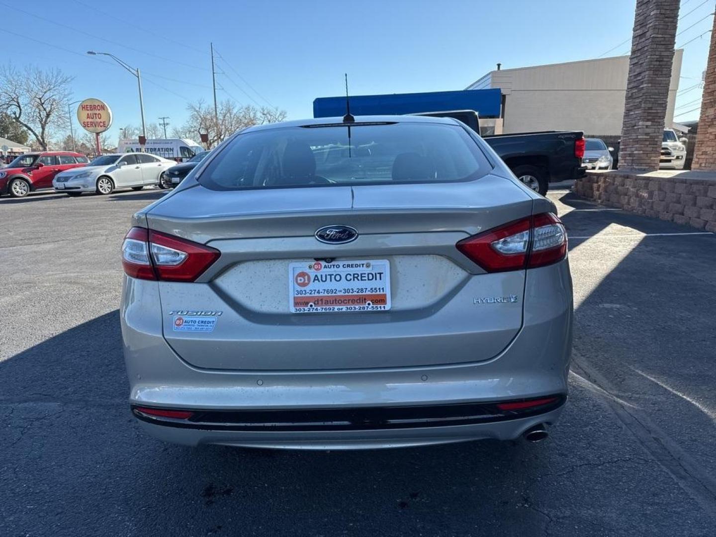 2015 Tectonic /Charcoal Black Ford Fusion Hybrid SE (3FA6P0LU4FR) with an I4 Hybrid engine, CVT transmission, located at 8595 Washington St., Thornton, CO, 80229, (303) 287-5511, 39.852348, -104.978447 - 2015 Ford Fusion Hybrid FWD I4 Hybrid.<br><br>D1 Auto NEVER charges dealer fees! All cars have clean titles and have been inspected for mechanical issues. We have financing for everyone. Good credit, bad credit, first time buyers.<br><br>Please call Lakewood Location 303-274-7692 or Thornton 303-287 - Photo#5