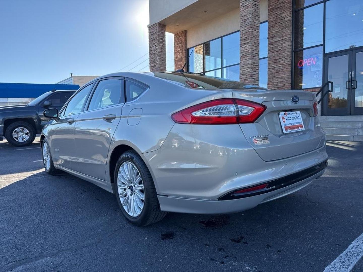 2015 Tectonic /Charcoal Black Ford Fusion Hybrid SE (3FA6P0LU4FR) with an I4 Hybrid engine, CVT transmission, located at 8595 Washington St., Thornton, CO, 80229, (303) 287-5511, 39.852348, -104.978447 - 2015 Ford Fusion Hybrid FWD I4 Hybrid.<br><br>D1 Auto NEVER charges dealer fees! All cars have clean titles and have been inspected for mechanical issues. We have financing for everyone. Good credit, bad credit, first time buyers.<br><br>Please call Lakewood Location 303-274-7692 or Thornton 303-287 - Photo#6