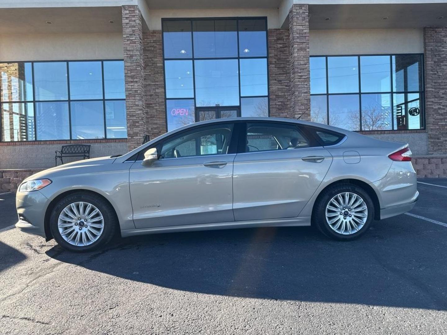 2015 Tectonic /Charcoal Black Ford Fusion Hybrid SE (3FA6P0LU4FR) with an I4 Hybrid engine, CVT transmission, located at 8595 Washington St., Thornton, CO, 80229, (303) 287-5511, 39.852348, -104.978447 - 2015 Ford Fusion Hybrid FWD I4 Hybrid.<br><br>D1 Auto NEVER charges dealer fees! All cars have clean titles and have been inspected for mechanical issues. We have financing for everyone. Good credit, bad credit, first time buyers.<br><br>Please call Lakewood Location 303-274-7692 or Thornton 303-287 - Photo#7