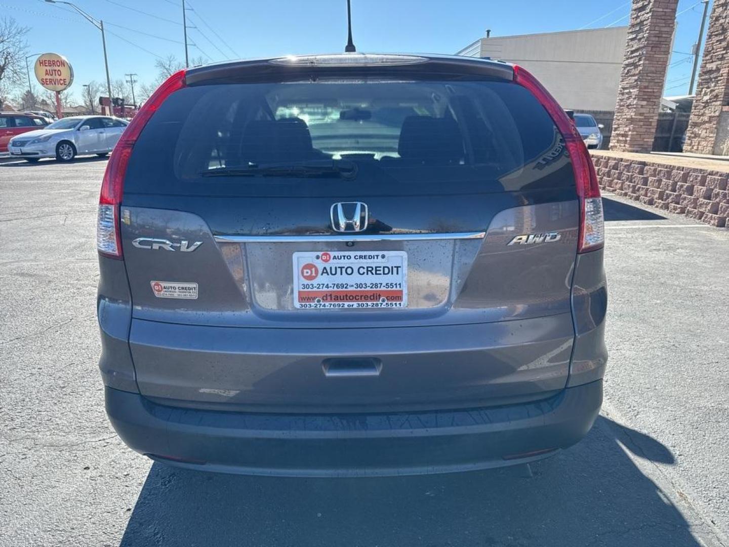 2014 Gray /Black Honda CR-V LX (2HKRM4H3XEH) with an 2.4L I4 DOHC 16V i-VTEC engine, Automatic transmission, located at 8595 Washington St., Thornton, CO, 80229, (303) 287-5511, 39.852348, -104.978447 - 2014 Honda CR-V CARFAX One-Owner. AWD AWD.<br><br>D1 Auto NEVER charges dealer fees! All cars have clean titles and have been inspected for mechanical issues. We have financing for everyone. Good credit, bad credit, first time buyers.<br>Clean CARFAX.<br>Please call Lakewood Location 303-274-7692 or - Photo#5