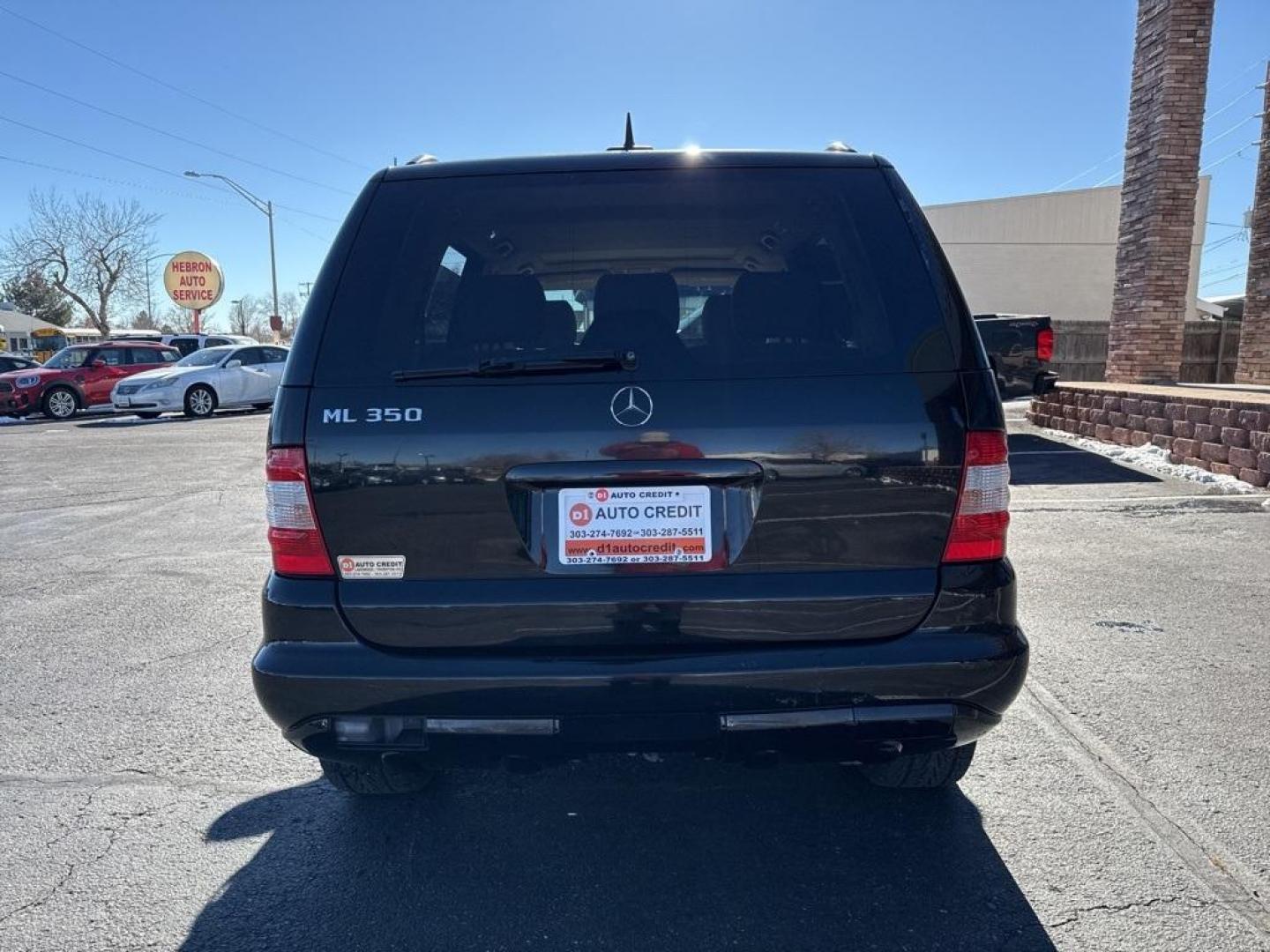 2003 Black /Java Mercedes-Benz M-Class ML 350 (4JGAB57E93A) with an 3.7L V6 SMPI SOHC engine, Automatic transmission, located at 10890 W. Colfax Ave., Lakewood, CO, 80215, (303) 274-7692, 39.739914, -105.120132 - 2003 Mercedes-Benz M-Class 4MATIC runs like a top. No oil leaks, recently serviced and ready for Colorado. Does need a radio and window regulator. This thing is a tank and runs amazing. <br><br>D1 Auto NEVER charges dealer fees! All cars have clean titles and have been inspected for mechanical issue - Photo#5