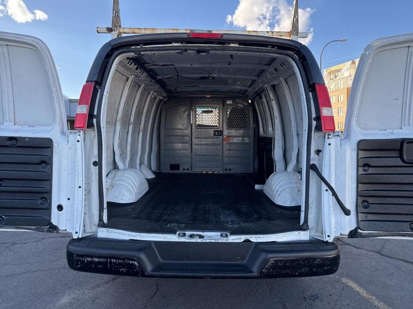 2015 Summit White /Medium Pewter Chevrolet Express 2500 Work Van (1GCWGFCFXF1) with an Vortec 4.8L V8 SFI engine, Automatic transmission, located at 8595 Washington St., Thornton, CO, 80229, (303) 287-5511, 39.852348, -104.978447 - 2015 Chevrolet Express 2500 CARFAX One-Owner. RWD Cargo<br><br>D1 Auto NEVER charges dealer fees! All cars have clean titles and have been inspected for mechanical issues. We have financing for everyone. Good credit, bad credit, first time buyers.<br>Clean CARFAX.<br>Please call Lakewood Location 30 - Photo#12