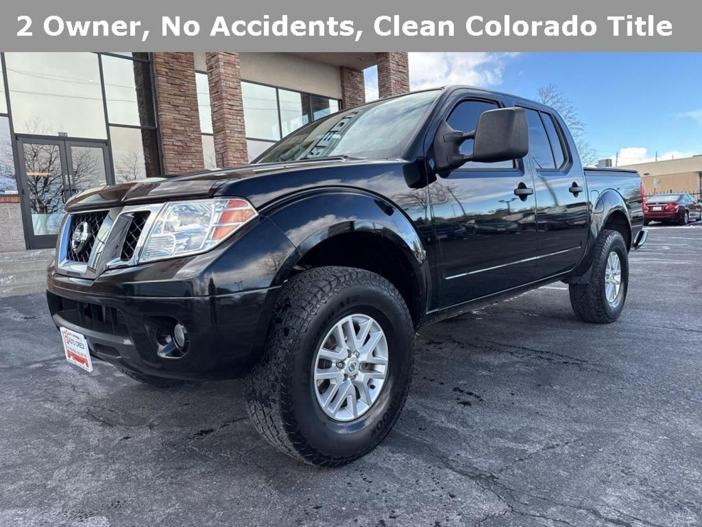 2015 Black /Graphite Nissan Frontier SV (1N6AD0EV5FN) with an 4.0L V6 DOHC engine, Automatic transmission, located at 8595 Washington St., Thornton, CO, 80229, (303) 287-5511, 39.852348, -104.978447 - 2015 Nissan Frontier SV 4WD with clean Carfax, no accidents and fully serviced. This truck is a non smoker, non pet car and has a 2 inch leveling kit and soft tanneau cover. You can tell the previous owner took good care if this one. <br><br>All Cars Have Clean Titles And Are Serviced Before Sale., - Photo#0