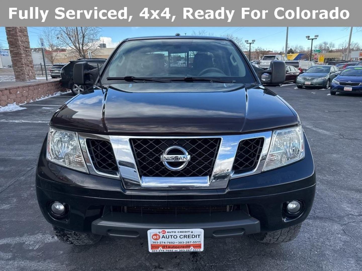 2015 Black /Graphite Nissan Frontier SV (1N6AD0EV5FN) with an 4.0L V6 DOHC engine, Automatic transmission, located at 8595 Washington St., Thornton, CO, 80229, (303) 287-5511, 39.852348, -104.978447 - 2015 Nissan Frontier SV 4WD with clean Carfax, no accidents and fully serviced. This truck is a non smoker, non pet car and has a 2 inch leveling kit and soft tanneau cover. You can tell the previous owner took good care if this one. <br><br>All Cars Have Clean Titles And Are Serviced Before Sale., - Photo#1