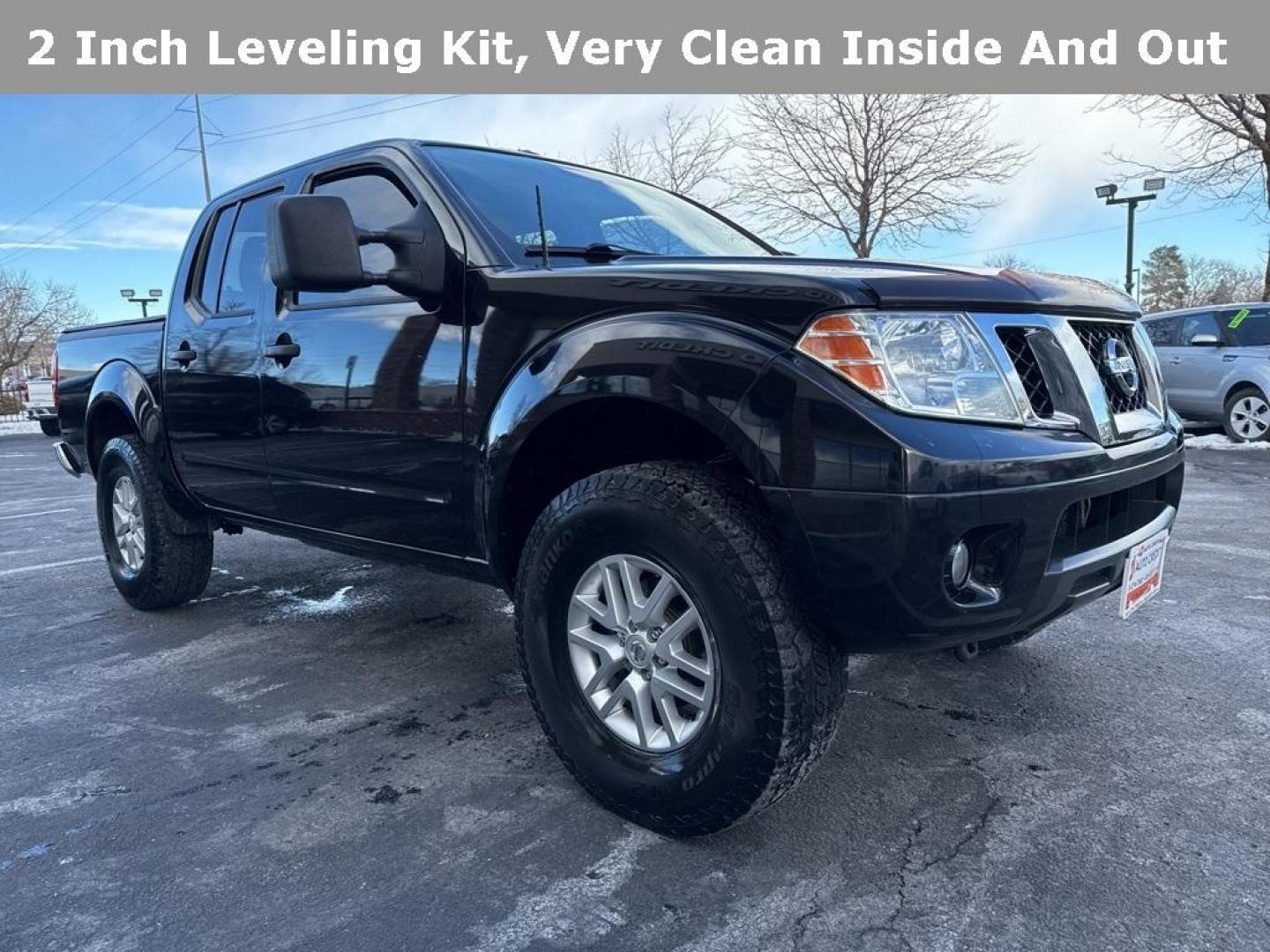 2015 Black /Graphite Nissan Frontier SV (1N6AD0EV5FN) with an 4.0L V6 DOHC engine, Automatic transmission, located at 8595 Washington St., Thornton, CO, 80229, (303) 287-5511, 39.852348, -104.978447 - 2015 Nissan Frontier SV 4WD with clean Carfax, no accidents and fully serviced. This truck is a non smoker, non pet car and has a 2 inch leveling kit and soft tanneau cover. You can tell the previous owner took good care if this one. <br><br>All Cars Have Clean Titles And Are Serviced Before Sale., - Photo#2