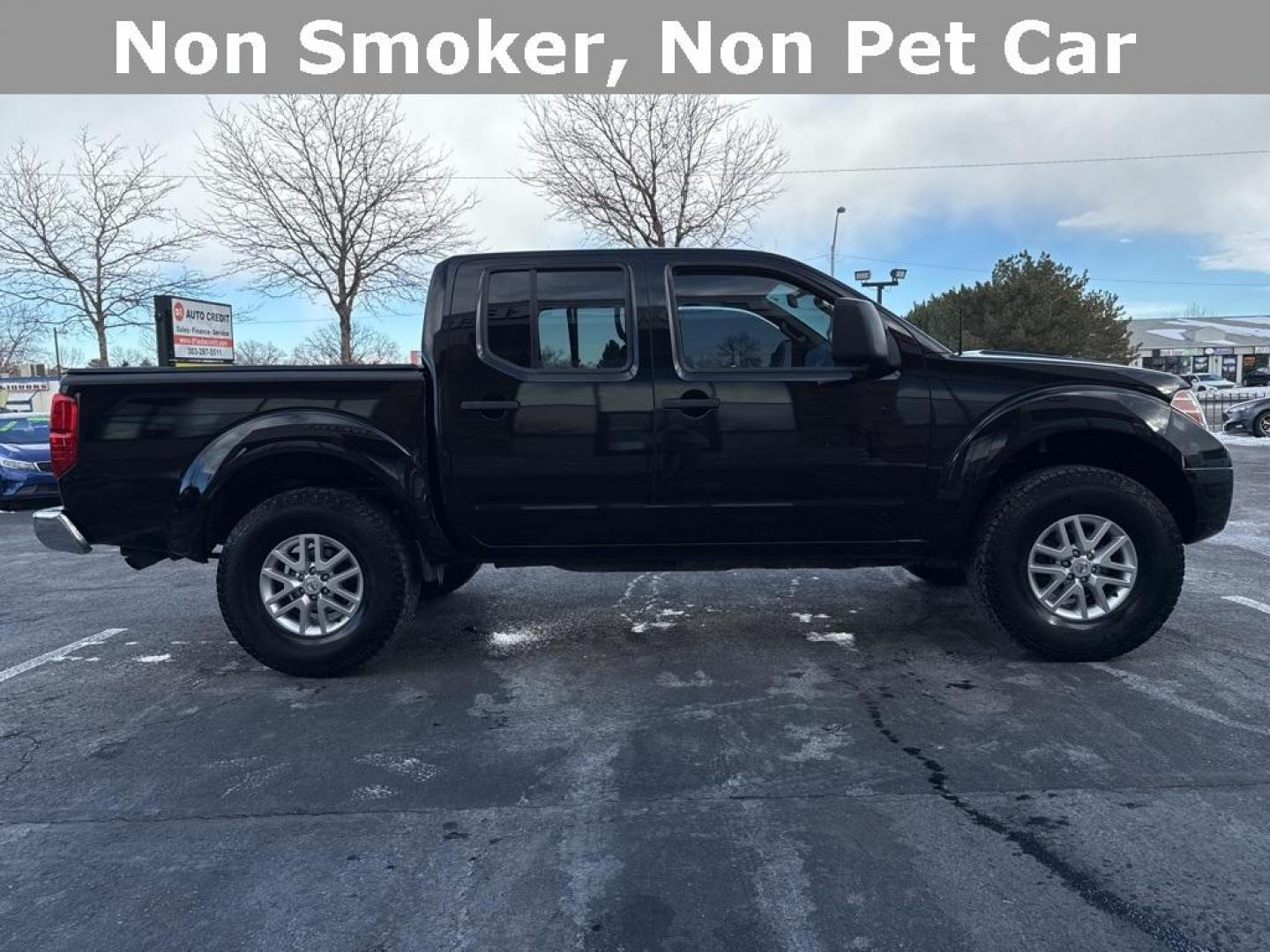 2015 Black /Graphite Nissan Frontier SV (1N6AD0EV5FN) with an 4.0L V6 DOHC engine, Automatic transmission, located at 8595 Washington St., Thornton, CO, 80229, (303) 287-5511, 39.852348, -104.978447 - 2015 Nissan Frontier SV 4WD with clean Carfax, no accidents and fully serviced. This truck is a non smoker, non pet car and has a 2 inch leveling kit and soft tanneau cover. You can tell the previous owner took good care if this one. <br><br>All Cars Have Clean Titles And Are Serviced Before Sale., - Photo#3