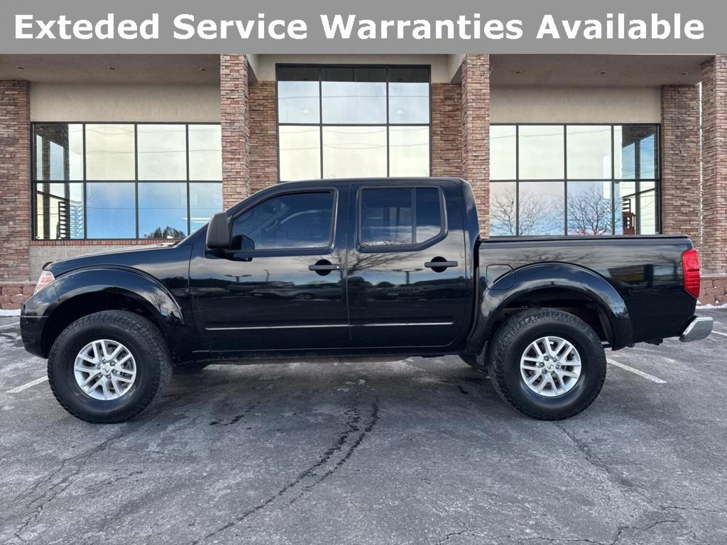 2015 Black /Graphite Nissan Frontier SV (1N6AD0EV5FN) with an 4.0L V6 DOHC engine, Automatic transmission, located at 8595 Washington St., Thornton, CO, 80229, (303) 287-5511, 39.852348, -104.978447 - 2015 Nissan Frontier SV 4WD with clean Carfax, no accidents and fully serviced. This truck is a non smoker, non pet car and has a 2 inch leveling kit and soft tanneau cover. You can tell the previous owner took good care if this one. <br><br>All Cars Have Clean Titles And Are Serviced Before Sale., - Photo#4