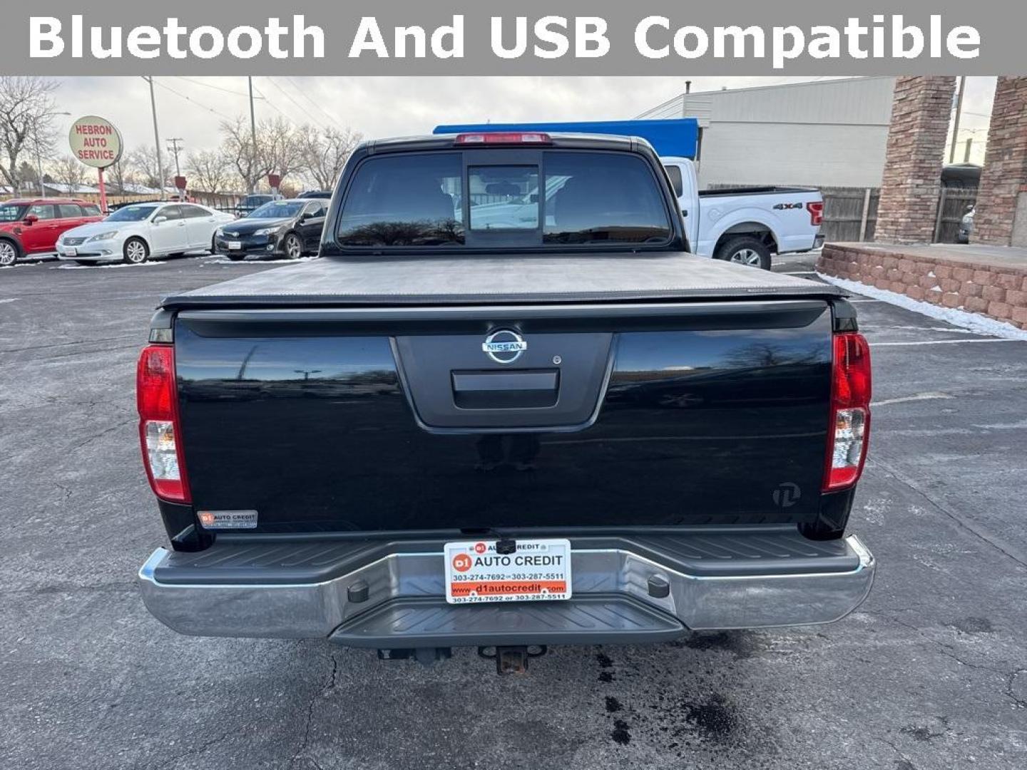 2015 Black /Graphite Nissan Frontier SV (1N6AD0EV5FN) with an 4.0L V6 DOHC engine, Automatic transmission, located at 8595 Washington St., Thornton, CO, 80229, (303) 287-5511, 39.852348, -104.978447 - 2015 Nissan Frontier SV 4WD with clean Carfax, no accidents and fully serviced. This truck is a non smoker, non pet car and has a 2 inch leveling kit and soft tanneau cover. You can tell the previous owner took good care if this one. <br><br>All Cars Have Clean Titles And Are Serviced Before Sale., - Photo#6