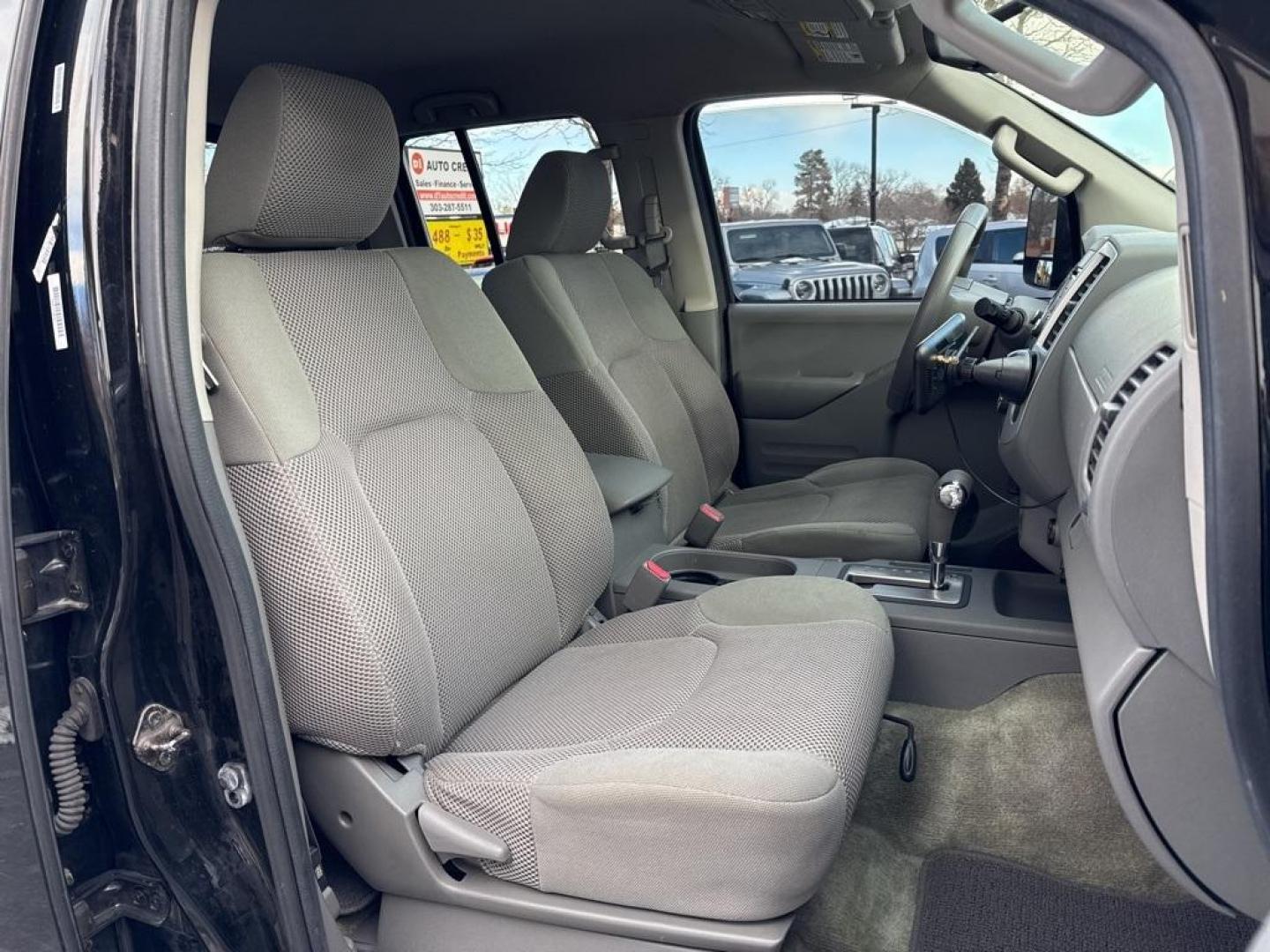 2015 Black /Graphite Nissan Frontier SV (1N6AD0EV5FN) with an 4.0L V6 DOHC engine, Automatic transmission, located at 8595 Washington St., Thornton, CO, 80229, (303) 287-5511, 39.852348, -104.978447 - 2015 Nissan Frontier SV 4WD with clean Carfax, no accidents and fully serviced. This truck is a non smoker, non pet car and has a 2 inch leveling kit and soft tanneau cover. You can tell the previous owner took good care if this one. <br><br>All Cars Have Clean Titles And Are Serviced Before Sale., - Photo#15