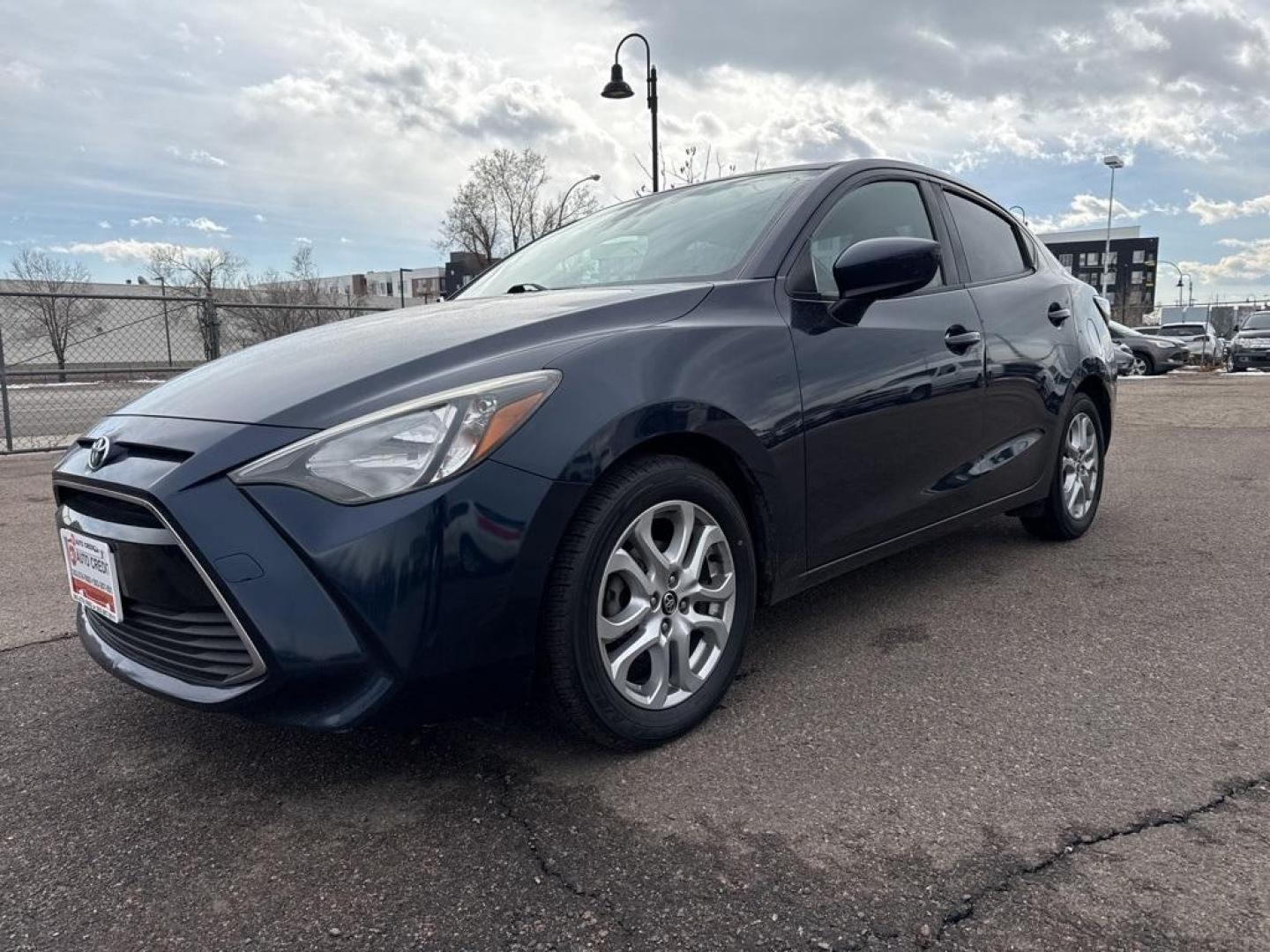 2017 Abyss /Mid Blue Black Toyota Yaris iA Base (3MYDLBYV6HY) with an 1.5L DOHC engine, Automatic transmission, located at 8595 Washington St., Thornton, CO, 80229, (303) 287-5511, 39.852348, -104.978447 - 2017 Toyota Yaris iA FWD<br><br>D1 Auto NEVER charges dealer fees! All cars have clean titles and have been inspected for mechanical issues. We have financing for everyone. Good credit, bad credit, first time buyers.<br>Clean CARFAX.<br>Please call Lakewood Location 303-274-7692 or Thornton 303-287- - Photo#0