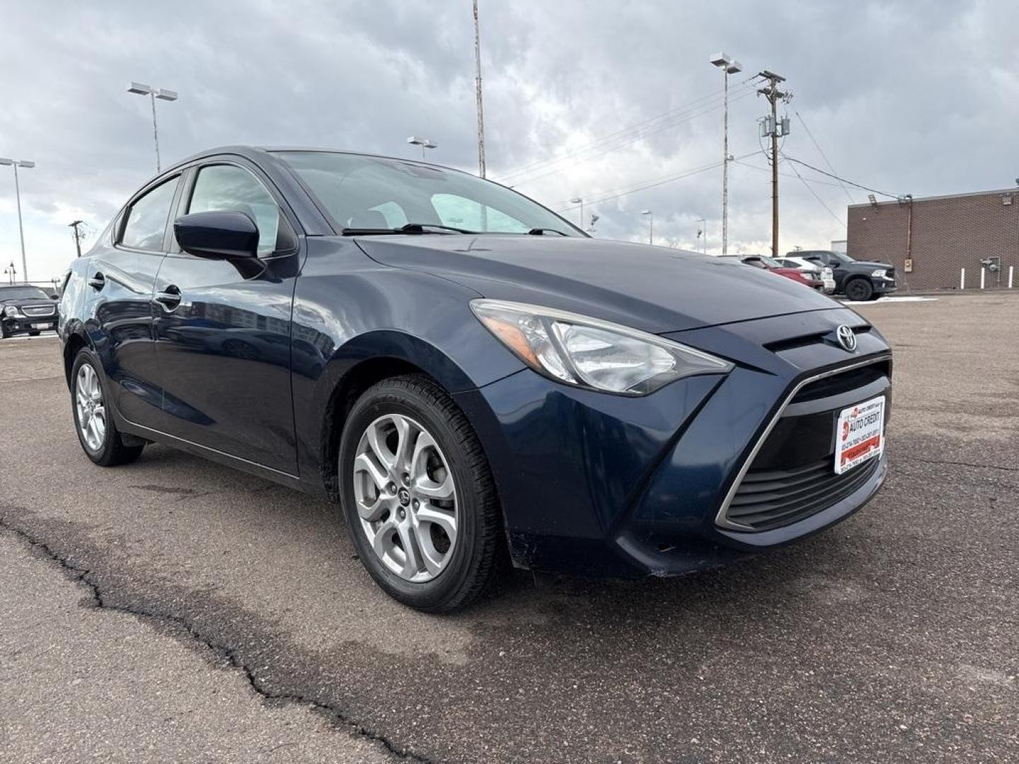 2017 Abyss /Mid Blue Black Toyota Yaris iA Base (3MYDLBYV6HY) with an 1.5L DOHC engine, Automatic transmission, located at 8595 Washington St., Thornton, CO, 80229, (303) 287-5511, 39.852348, -104.978447 - 2017 Toyota Yaris iA FWD<br><br>D1 Auto NEVER charges dealer fees! All cars have clean titles and have been inspected for mechanical issues. We have financing for everyone. Good credit, bad credit, first time buyers.<br>Clean CARFAX.<br>Please call Lakewood Location 303-274-7692 or Thornton 303-287- - Photo#2