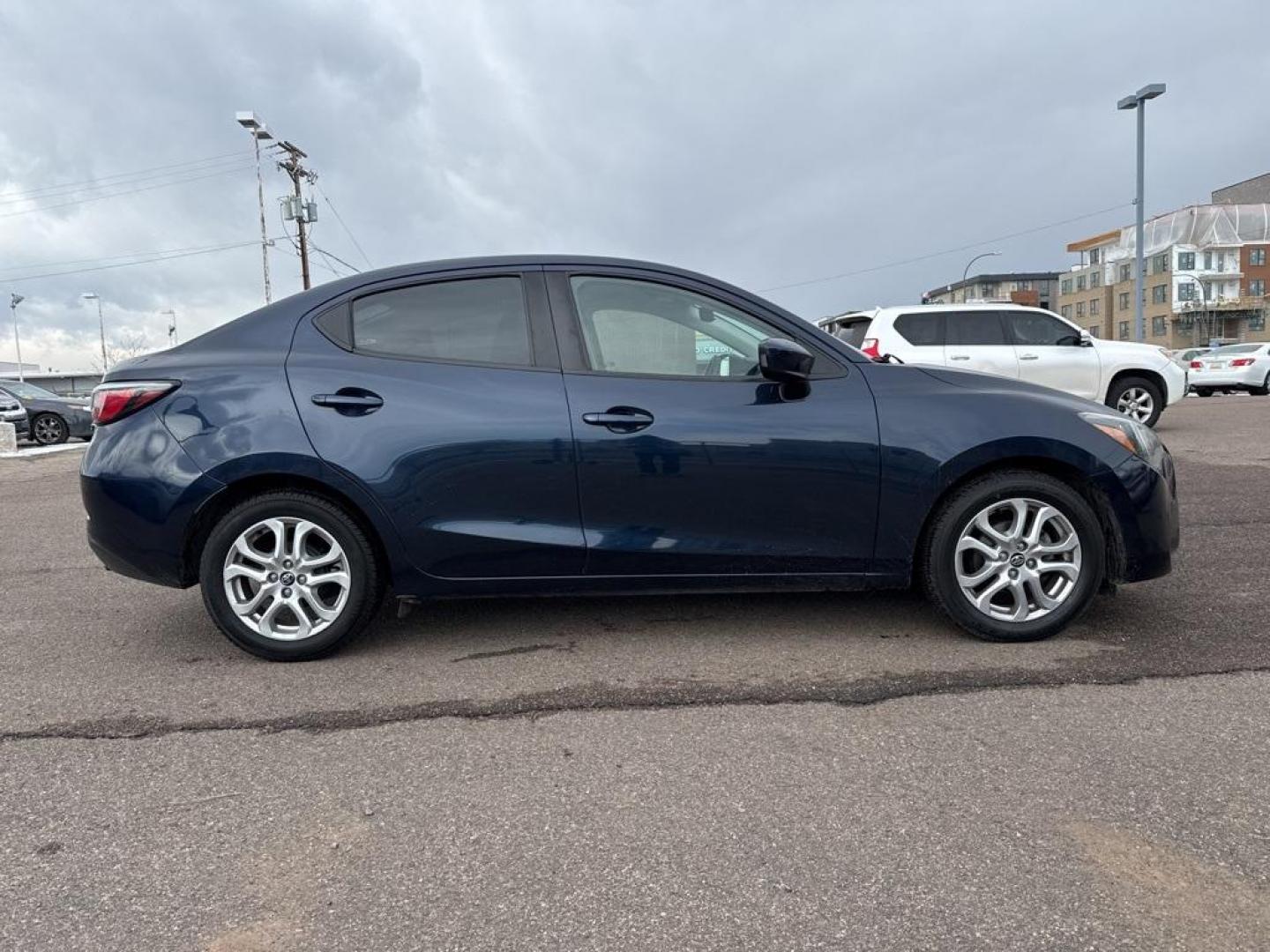 2017 Abyss /Mid Blue Black Toyota Yaris iA Base (3MYDLBYV6HY) with an 1.5L DOHC engine, Automatic transmission, located at 8595 Washington St., Thornton, CO, 80229, (303) 287-5511, 39.852348, -104.978447 - 2017 Toyota Yaris iA FWD<br><br>D1 Auto NEVER charges dealer fees! All cars have clean titles and have been inspected for mechanical issues. We have financing for everyone. Good credit, bad credit, first time buyers.<br>Clean CARFAX.<br>Please call Lakewood Location 303-274-7692 or Thornton 303-287- - Photo#3