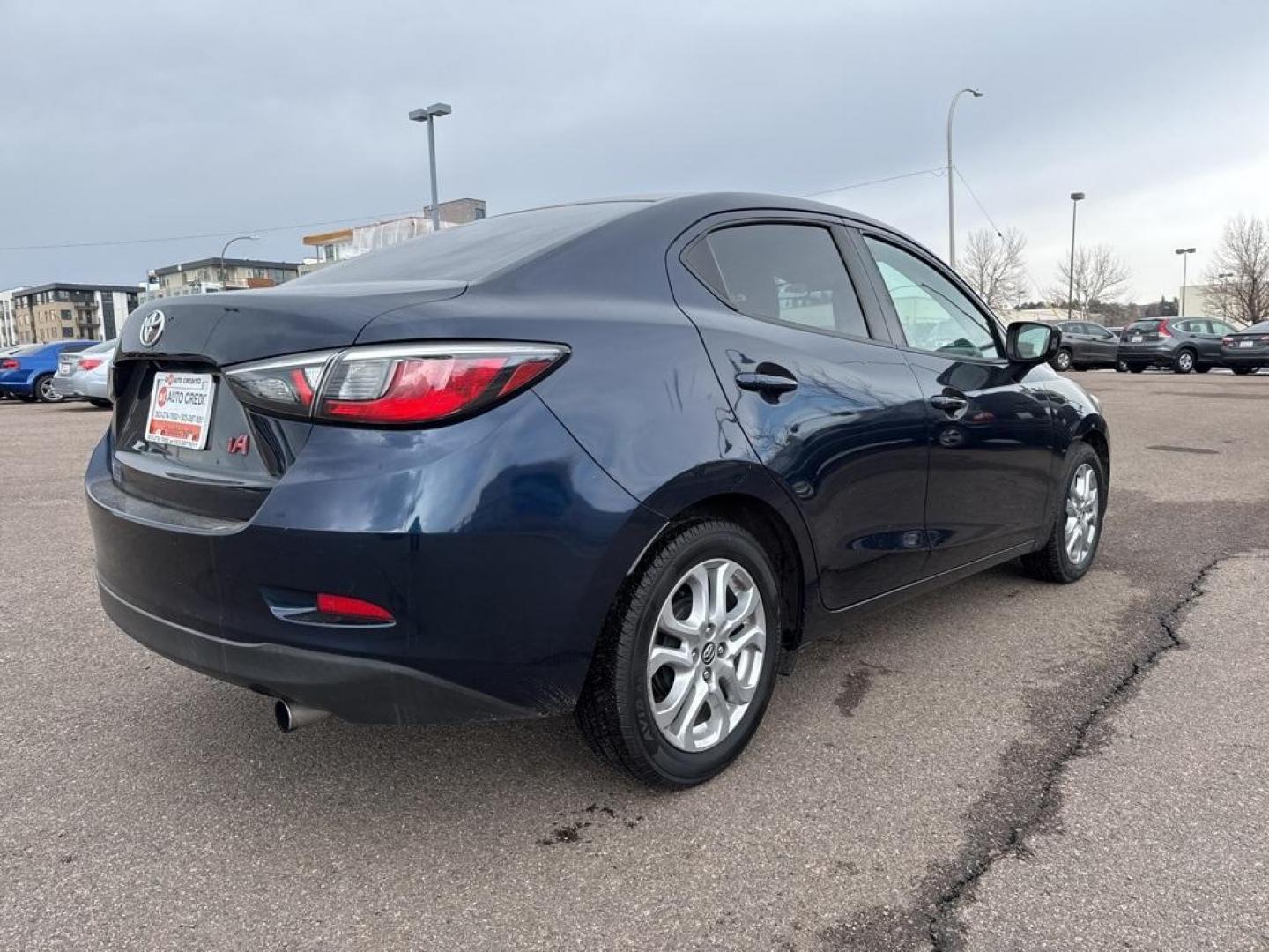 2017 Abyss /Mid Blue Black Toyota Yaris iA Base (3MYDLBYV6HY) with an 1.5L DOHC engine, Automatic transmission, located at 8595 Washington St., Thornton, CO, 80229, (303) 287-5511, 39.852348, -104.978447 - 2017 Toyota Yaris iA FWD<br><br>D1 Auto NEVER charges dealer fees! All cars have clean titles and have been inspected for mechanical issues. We have financing for everyone. Good credit, bad credit, first time buyers.<br>Clean CARFAX.<br>Please call Lakewood Location 303-274-7692 or Thornton 303-287- - Photo#4