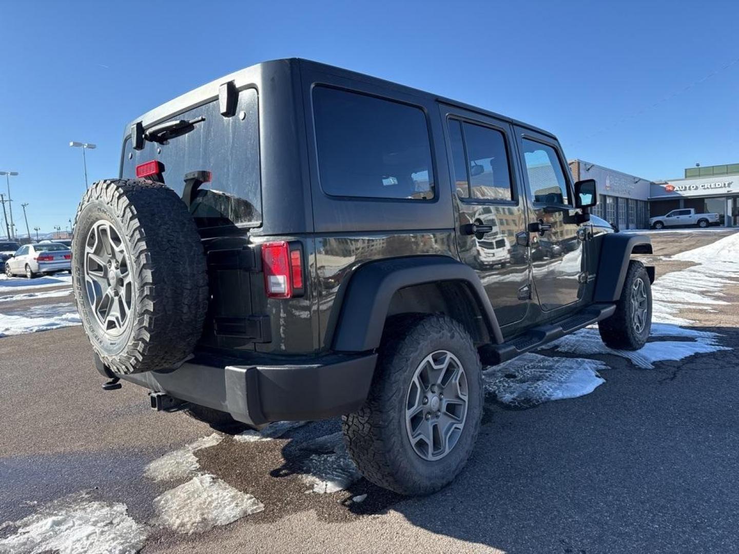 2015 Tank Clearcoat /Black Jeep Wrangler Unlimited Rubicon (1C4BJWFG7FL) with an 3.6L V6 24V VVT engine, Manual transmission, located at 10890 W. Colfax Ave., Lakewood, CO, 80215, (303) 274-7692, 39.739914, -105.120132 - 2015 Jeep Wrangler 4WDD1 Auto NEVER charges dealer fees! All cars have clean titles and have been inspected for mechanical issues. We have financing for everyone. Good credit, bad credit, first time buyers.Clean CARFAX.Please call Lakewood Location 303-274-7692 or Thornton 303-287-5511 to schedule a - Photo#4