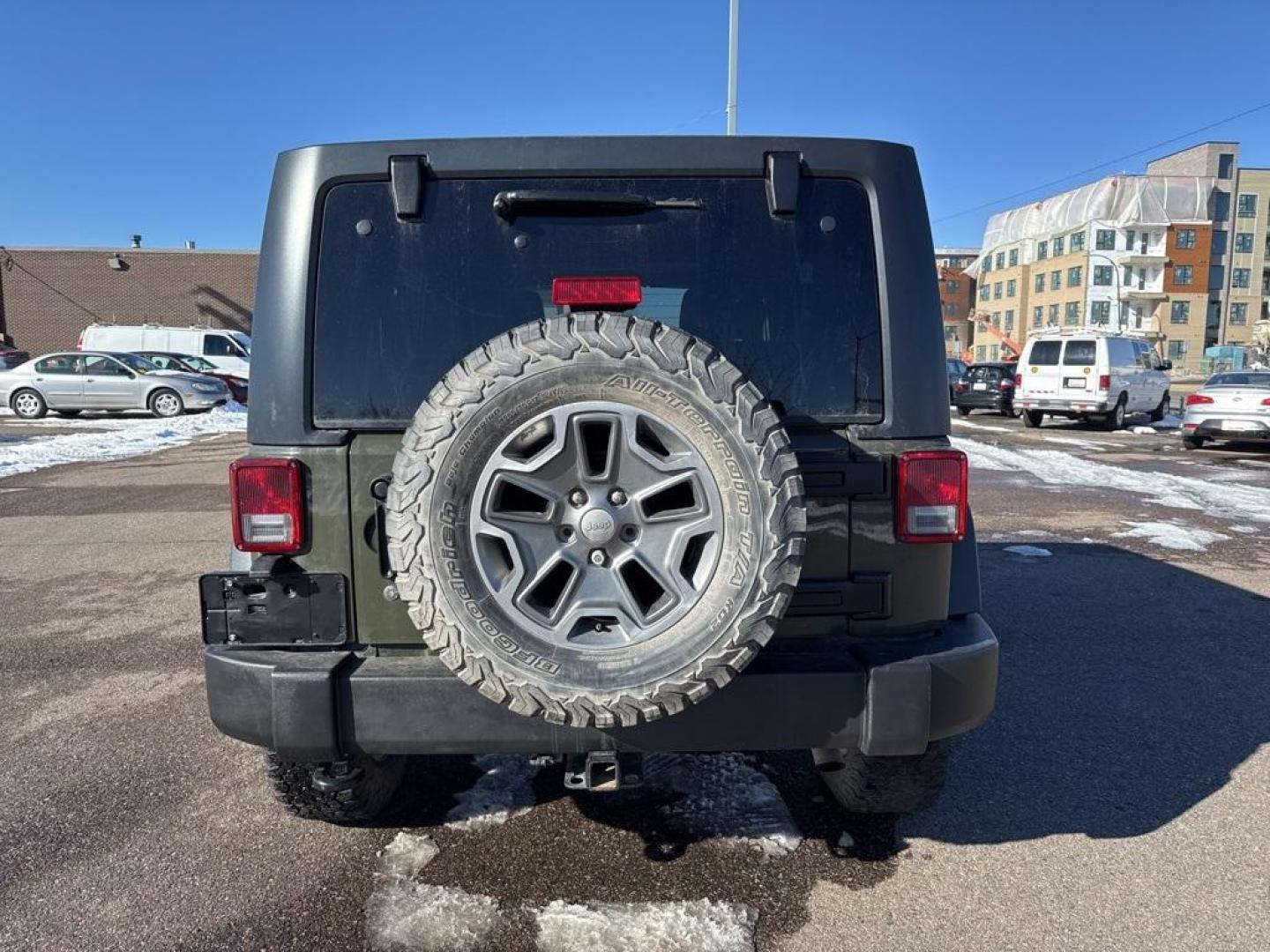 2015 Tank Clearcoat /Black Jeep Wrangler Unlimited Rubicon (1C4BJWFG7FL) with an 3.6L V6 24V VVT engine, Manual transmission, located at 10890 W. Colfax Ave., Lakewood, CO, 80215, (303) 274-7692, 39.739914, -105.120132 - 2015 Jeep Wrangler 4WDD1 Auto NEVER charges dealer fees! All cars have clean titles and have been inspected for mechanical issues. We have financing for everyone. Good credit, bad credit, first time buyers.Clean CARFAX.Please call Lakewood Location 303-274-7692 or Thornton 303-287-5511 to schedule a - Photo#5