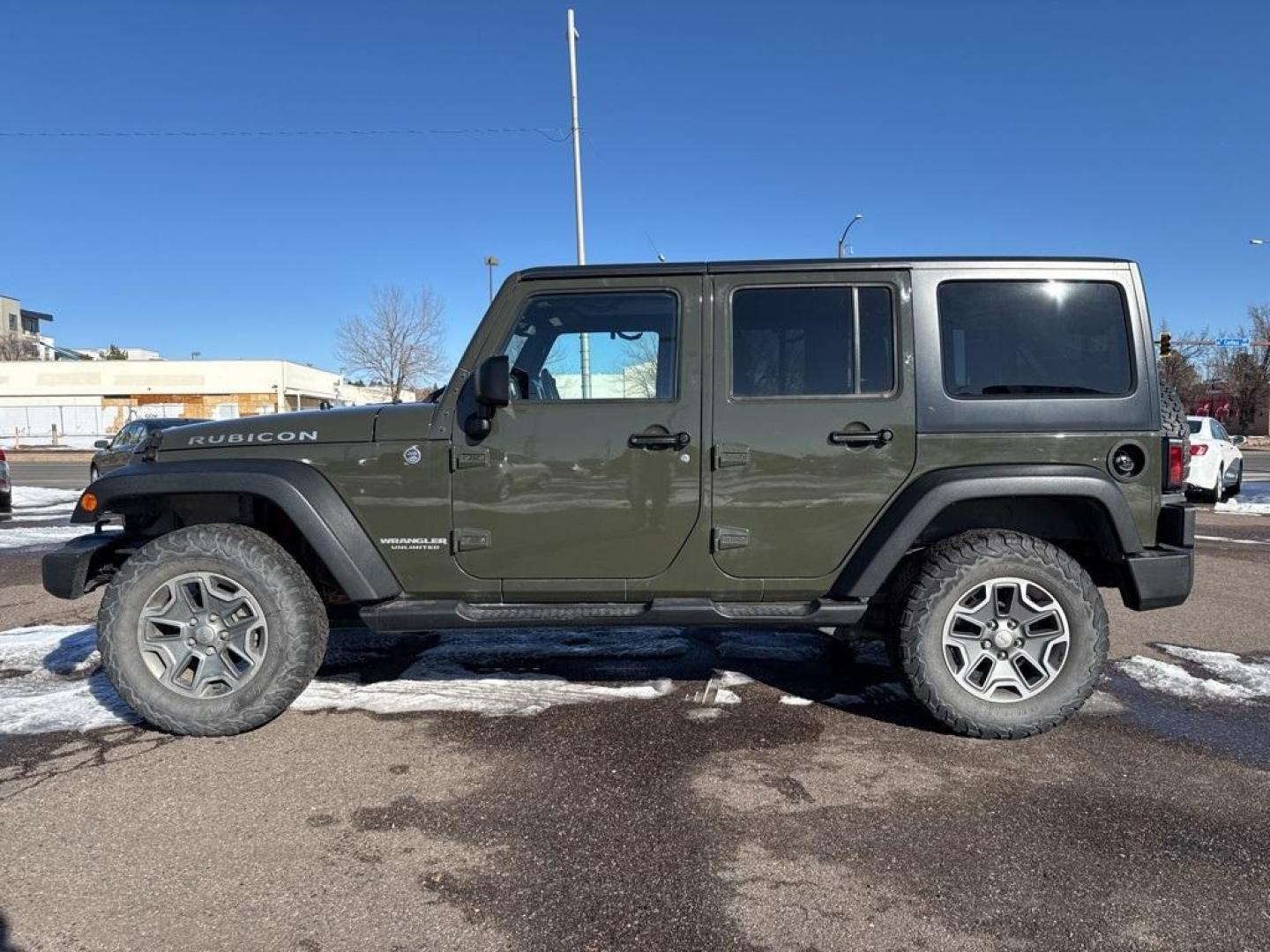 2015 Tank Clearcoat /Black Jeep Wrangler Unlimited Rubicon (1C4BJWFG7FL) with an 3.6L V6 24V VVT engine, Manual transmission, located at 10890 W. Colfax Ave., Lakewood, CO, 80215, (303) 274-7692, 39.739914, -105.120132 - 2015 Jeep Wrangler 4WDD1 Auto NEVER charges dealer fees! All cars have clean titles and have been inspected for mechanical issues. We have financing for everyone. Good credit, bad credit, first time buyers.Clean CARFAX.Please call Lakewood Location 303-274-7692 or Thornton 303-287-5511 to schedule a - Photo#7