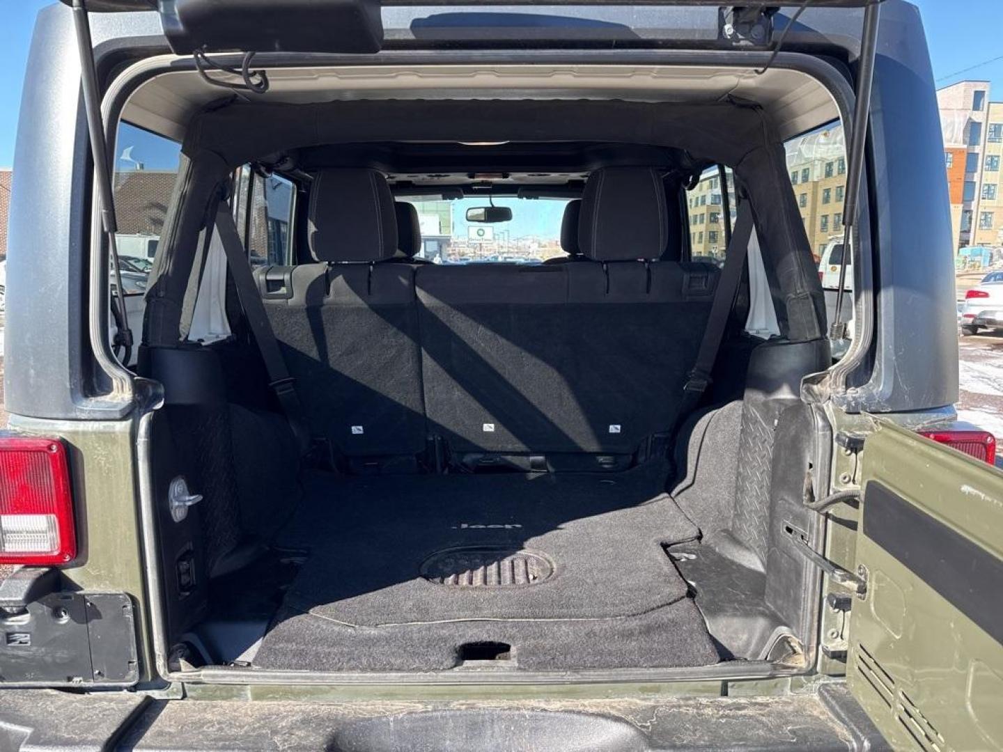 2015 Tank Clearcoat /Black Jeep Wrangler Unlimited Rubicon (1C4BJWFG7FL) with an 3.6L V6 24V VVT engine, Manual transmission, located at 10890 W. Colfax Ave., Lakewood, CO, 80215, (303) 274-7692, 39.739914, -105.120132 - 2015 Jeep Wrangler 4WDD1 Auto NEVER charges dealer fees! All cars have clean titles and have been inspected for mechanical issues. We have financing for everyone. Good credit, bad credit, first time buyers.Clean CARFAX.Please call Lakewood Location 303-274-7692 or Thornton 303-287-5511 to schedule a - Photo#11