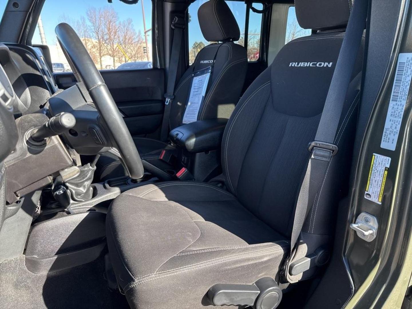 2015 Tank Clearcoat /Black Jeep Wrangler Unlimited Rubicon (1C4BJWFG7FL) with an 3.6L V6 24V VVT engine, Manual transmission, located at 10890 W. Colfax Ave., Lakewood, CO, 80215, (303) 274-7692, 39.739914, -105.120132 - 2015 Jeep Wrangler 4WDD1 Auto NEVER charges dealer fees! All cars have clean titles and have been inspected for mechanical issues. We have financing for everyone. Good credit, bad credit, first time buyers.Clean CARFAX.Please call Lakewood Location 303-274-7692 or Thornton 303-287-5511 to schedule a - Photo#15