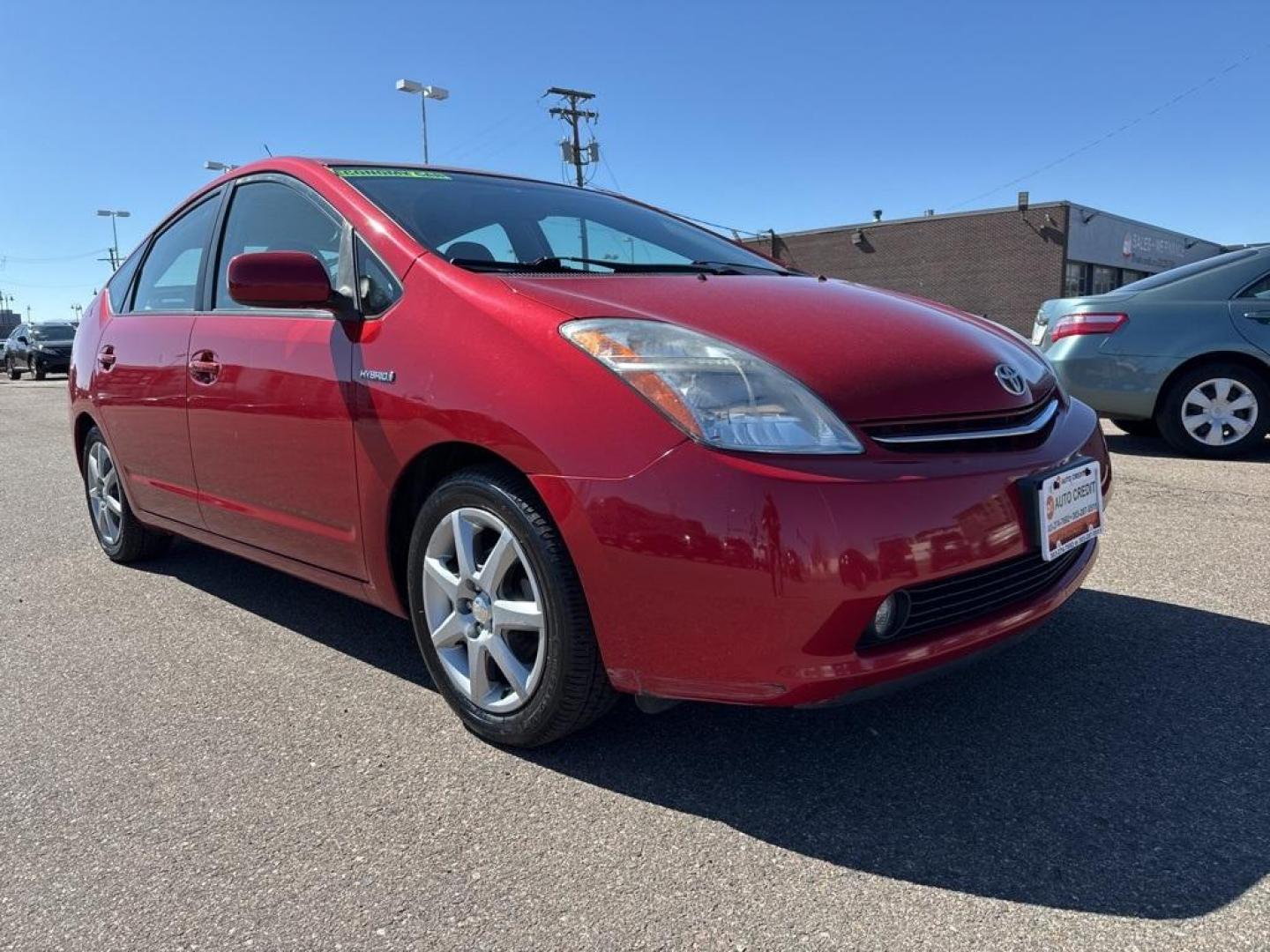 2007 Barcelona Red Metallic /Actual Toyota Prius (JTDKB20U677) with an 1.5L I4 SMPI DOHC engine, CVT transmission, located at 8595 Washington St., Thornton, CO, 80229, (303) 287-5511, 39.852348, -104.978447 - 2007 Toyota Prius FWD 1.5L I4 SMPI DOHC.<br><br>D1 Auto NEVER charges dealer fees! All cars have clean titles and have been inspected for mechanical issues. We have financing for everyone. Good credit, bad credit, first time buyers.<br>Clean CARFAX. Odometer is 57737 miles below market average!<br>P - Photo#2