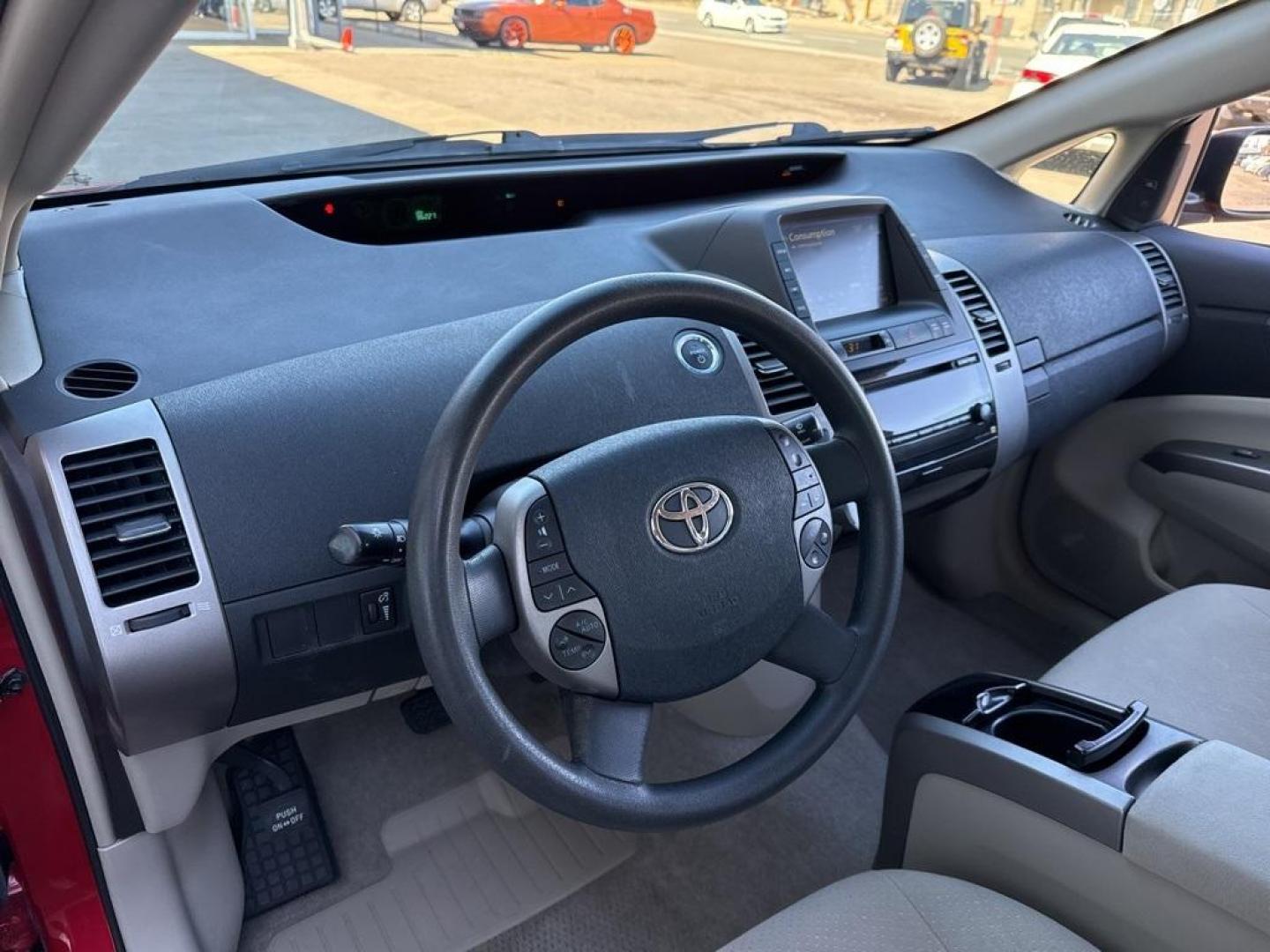 2007 Barcelona Red Metallic /Actual Toyota Prius (JTDKB20U677) with an 1.5L I4 SMPI DOHC engine, CVT transmission, located at 8595 Washington St., Thornton, CO, 80229, (303) 287-5511, 39.852348, -104.978447 - 2007 Toyota Prius FWD 1.5L I4 SMPI DOHC.<br><br>D1 Auto NEVER charges dealer fees! All cars have clean titles and have been inspected for mechanical issues. We have financing for everyone. Good credit, bad credit, first time buyers.<br>Clean CARFAX. Odometer is 57737 miles below market average!<br>P - Photo#17