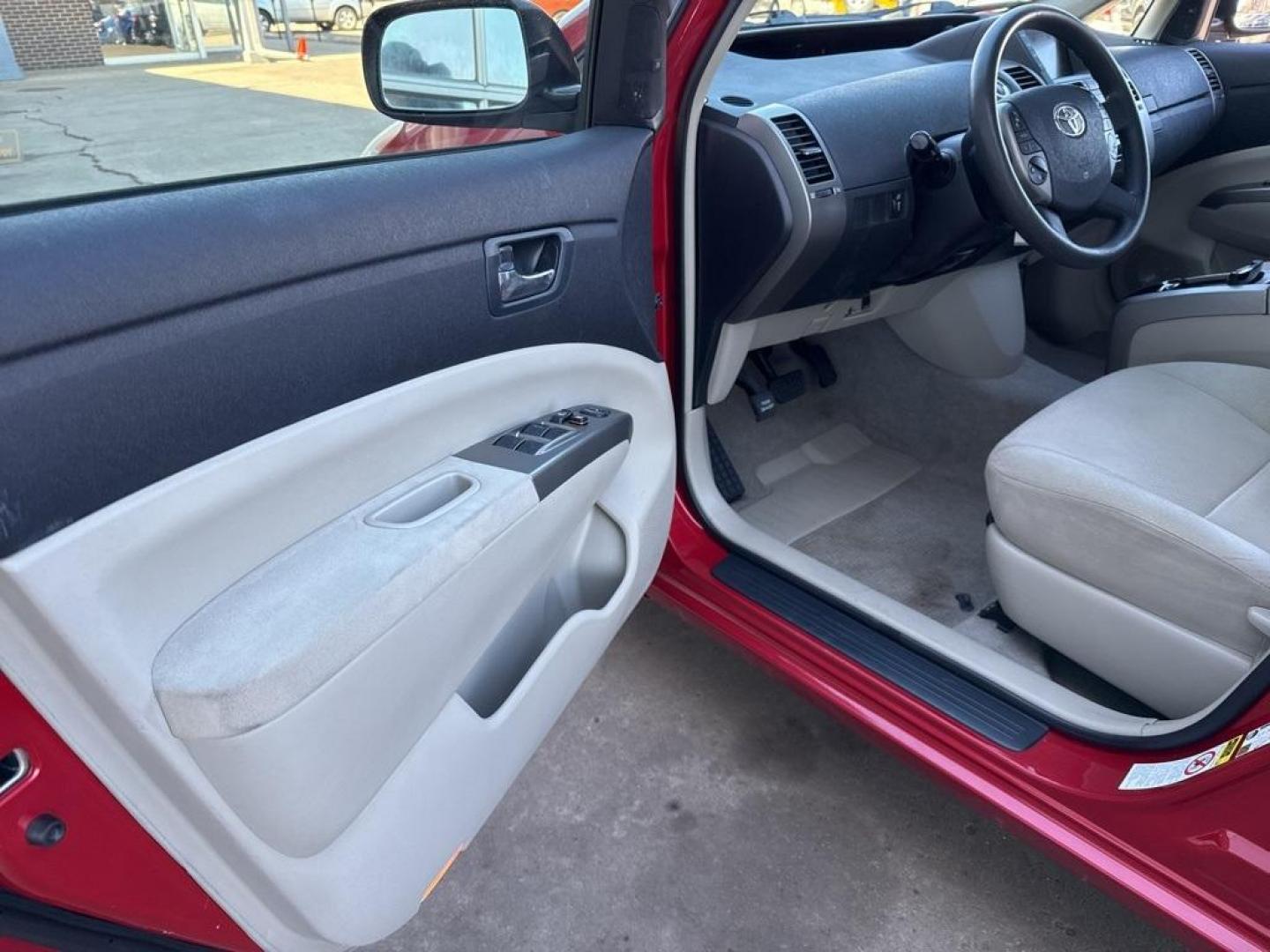 2007 Barcelona Red Metallic /Actual Toyota Prius (JTDKB20U677) with an 1.5L I4 SMPI DOHC engine, CVT transmission, located at 8595 Washington St., Thornton, CO, 80229, (303) 287-5511, 39.852348, -104.978447 - 2007 Toyota Prius FWD 1.5L I4 SMPI DOHC.<br><br>D1 Auto NEVER charges dealer fees! All cars have clean titles and have been inspected for mechanical issues. We have financing for everyone. Good credit, bad credit, first time buyers.<br>Clean CARFAX. Odometer is 51743 miles below market average!<br>P - Photo#26